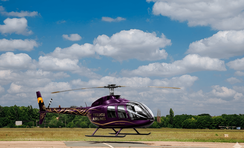 Helicopter on helipad under blue sky